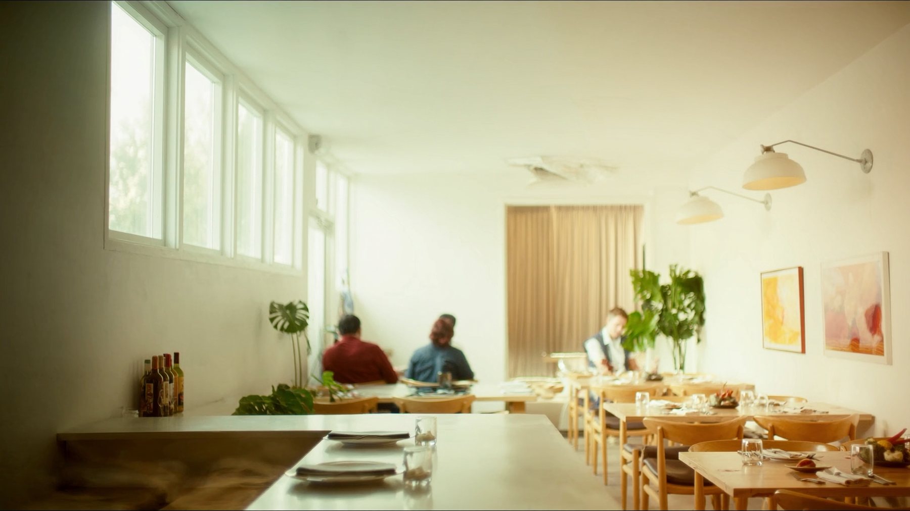 A bright, airy dine-in restaurant in warm daylight
